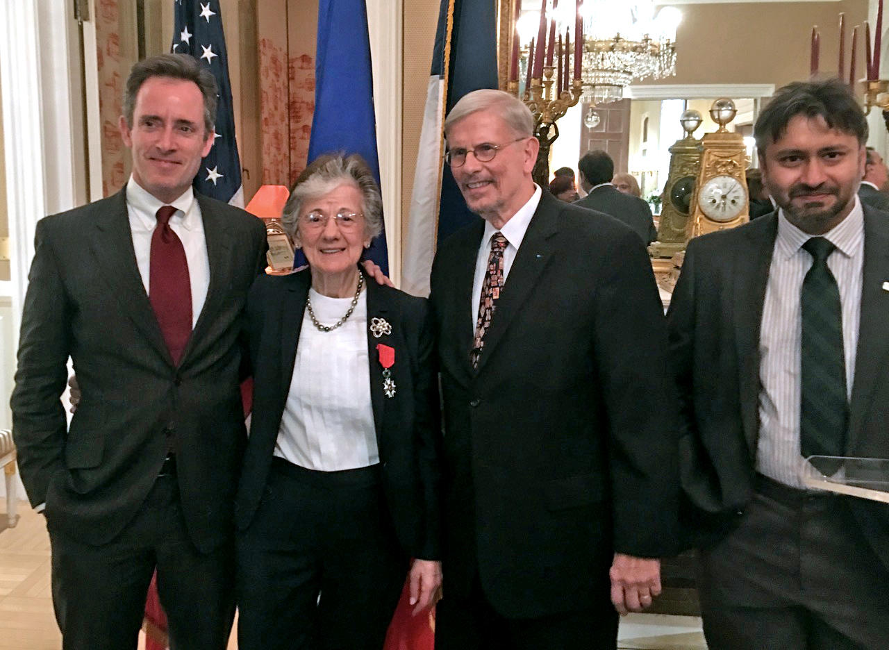 Dr. Rita Colwell receiving congratulations from fellow G.A.A.C. Council members, John Oldfield, Dennis Warner and Antar Jutla